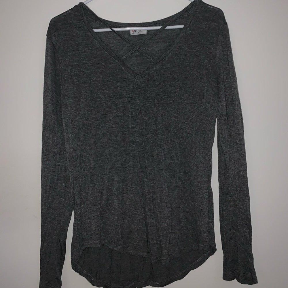 This is a gray long sleeve top